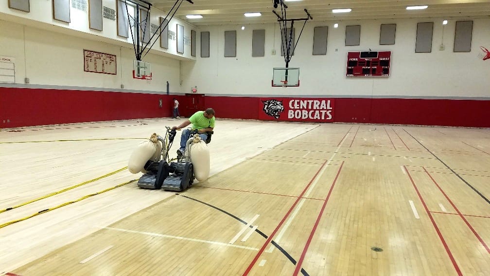 school gym hardwood floor basketball court