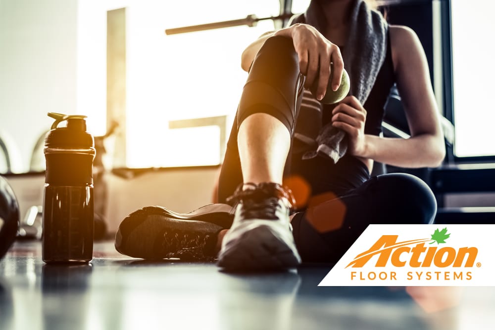 man working out on fitness flooring